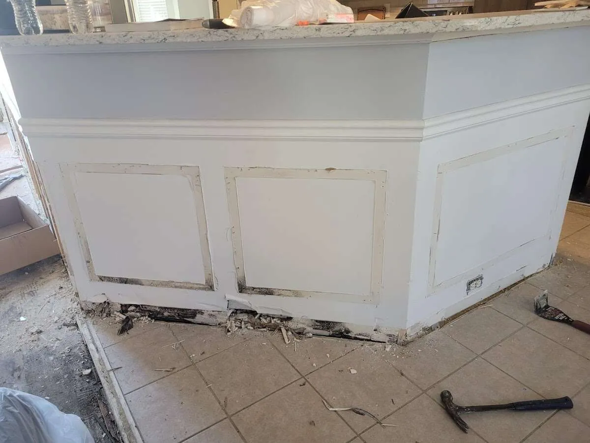 Water damage and mold on kitchen during Storm Damage Restoration in Derry
